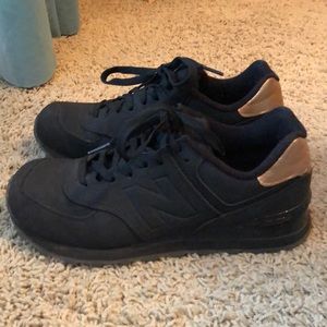 Black + Gold New Balance shoes, size 8